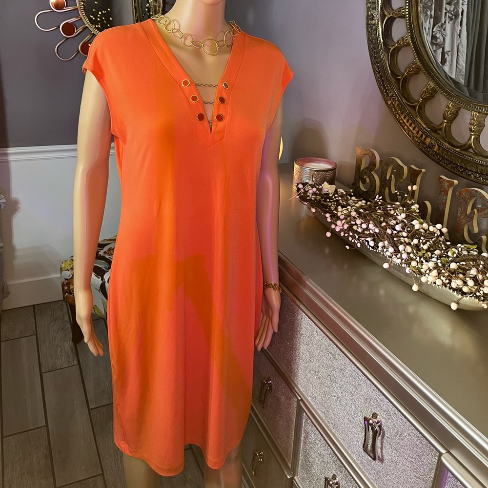 Calvin Klein Orange Aline dress 95%polyester 5%spandex. Slightly worn Dry clean